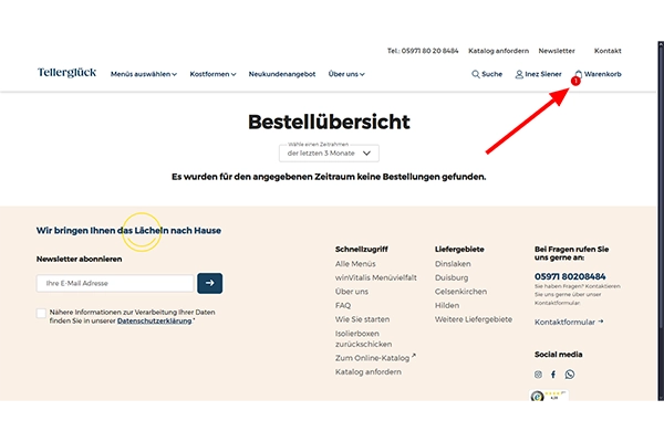roter Pfeil zeigt oben rechts auf Warenkorb
