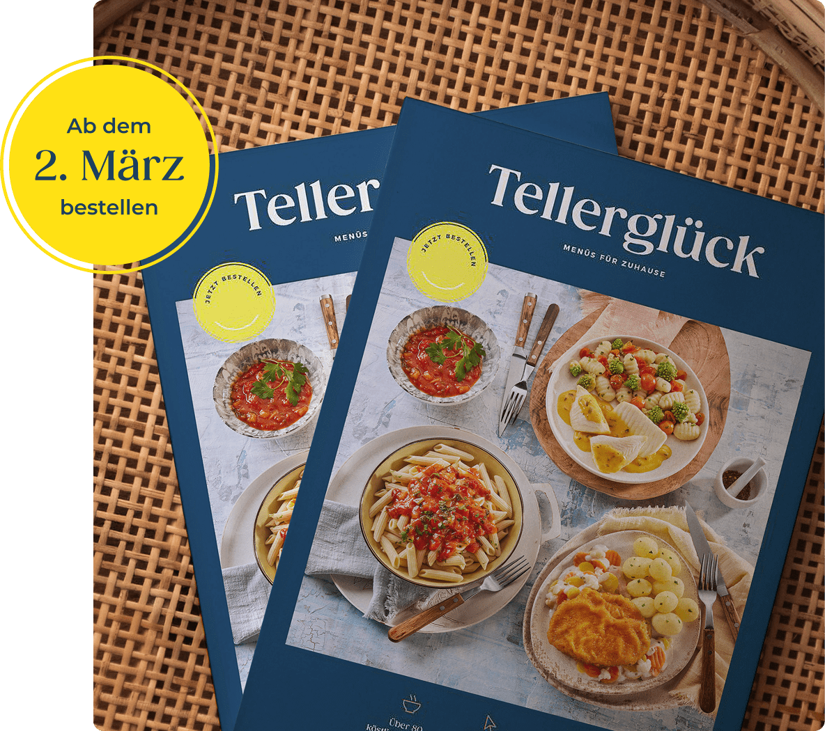 Auf einem geflochtenem Untergrund liegen zwei Kataloge des neuen Tellerglück-Sortiments. Oben rechts ist ein gelber Kreis zusehen, auf dem steht: "Ab dem 2. März bestellen".