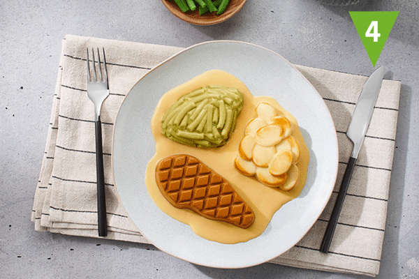 Püriertes Menü, geformt als Gemüse, Kartoffeln und Fleisch